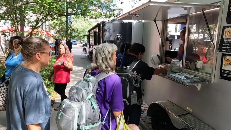 People in line at a food truck in Tampa