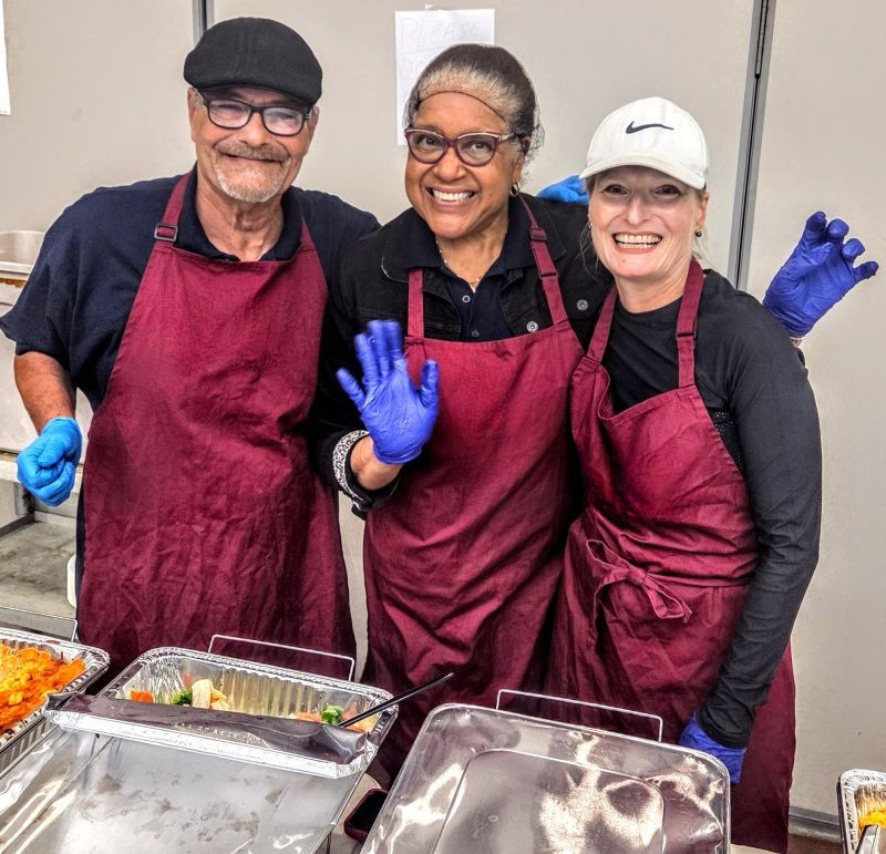 Volunteers Serving Food at Breadcoin Event